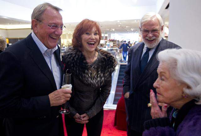 Dec. 12, 2013: Former general manager Norbert Stanislav, left, former public relations manager Melba Todd and Robert Ackerman who opened the Fort Worth Neiman Marcus all visit with long time customer Janie Beggs as the store celebrates 50 years in Fort Worth at the Ridgmar Mall store.